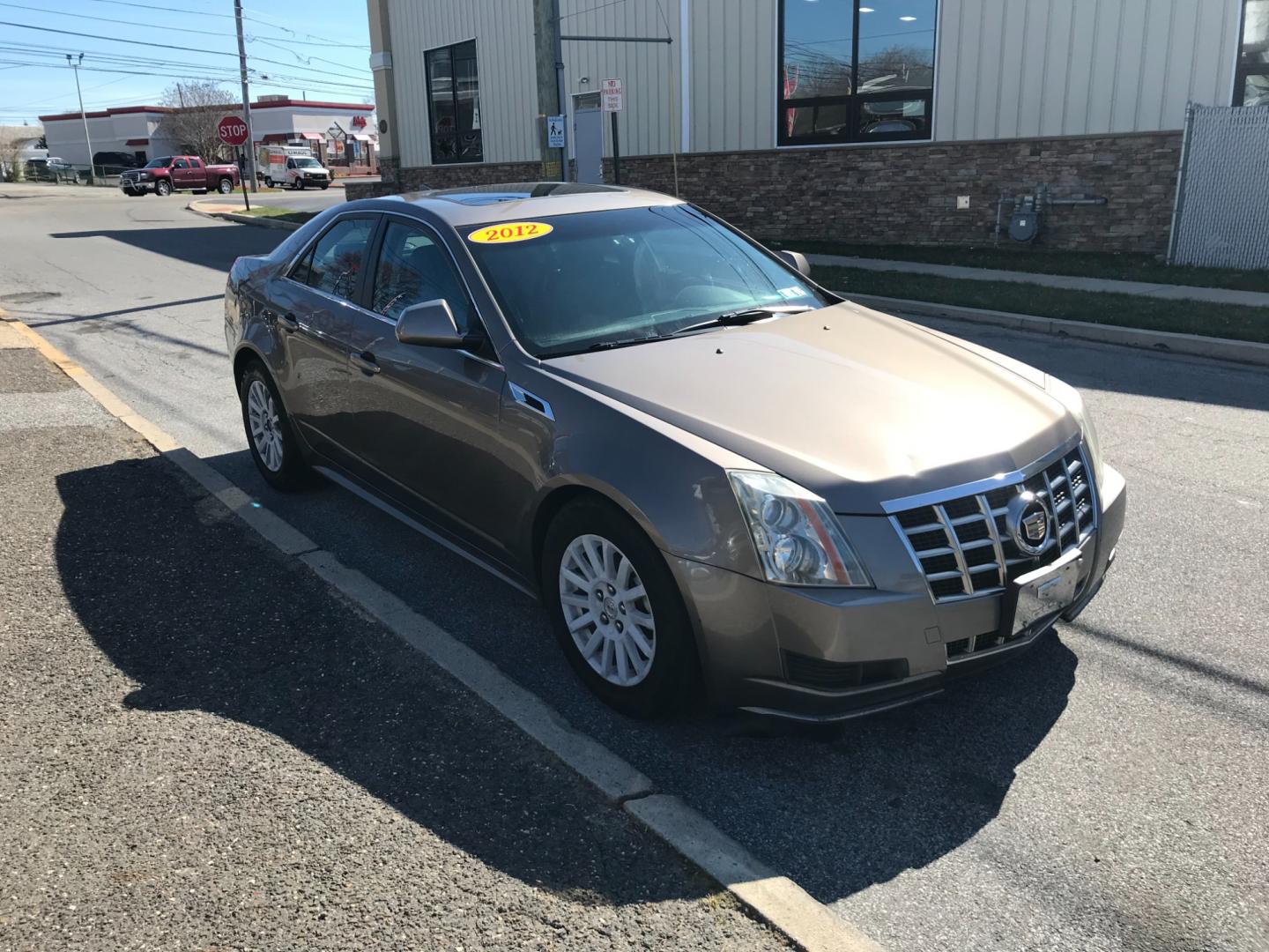 2012 Gray /Tan Cadillac CTS (1G6DC5E54C0) with an 3.0 V6 engine, Automatic transmission, located at 577 Chester Pike, Prospect Park, PA, 19076, (610) 237-1015, 39.886154, -75.302338 - Photo#3